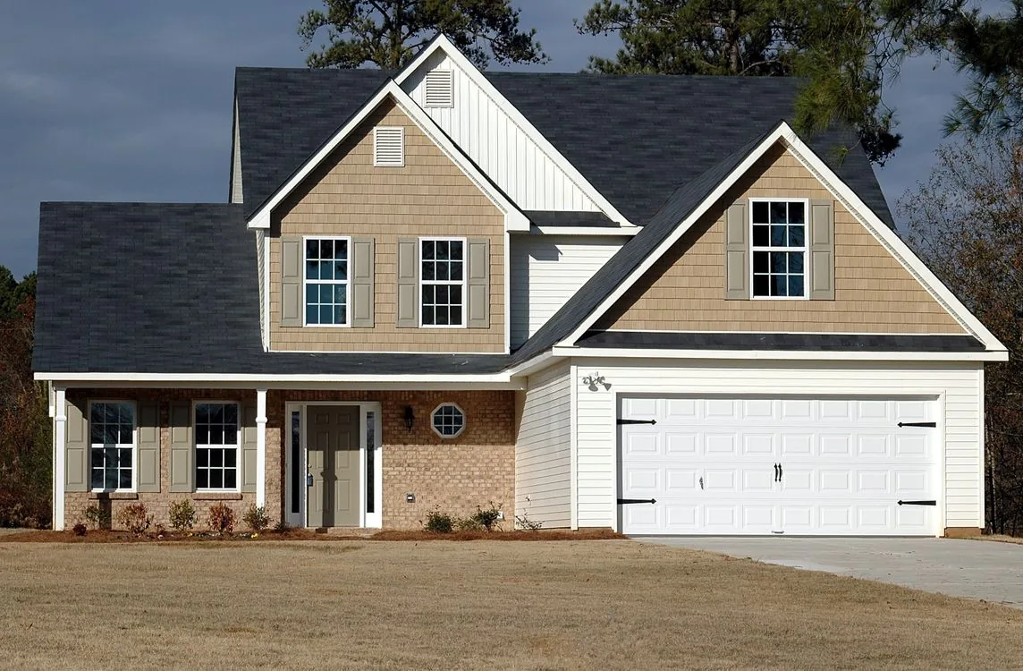 Gabled home with a dark asphalt shingle roof