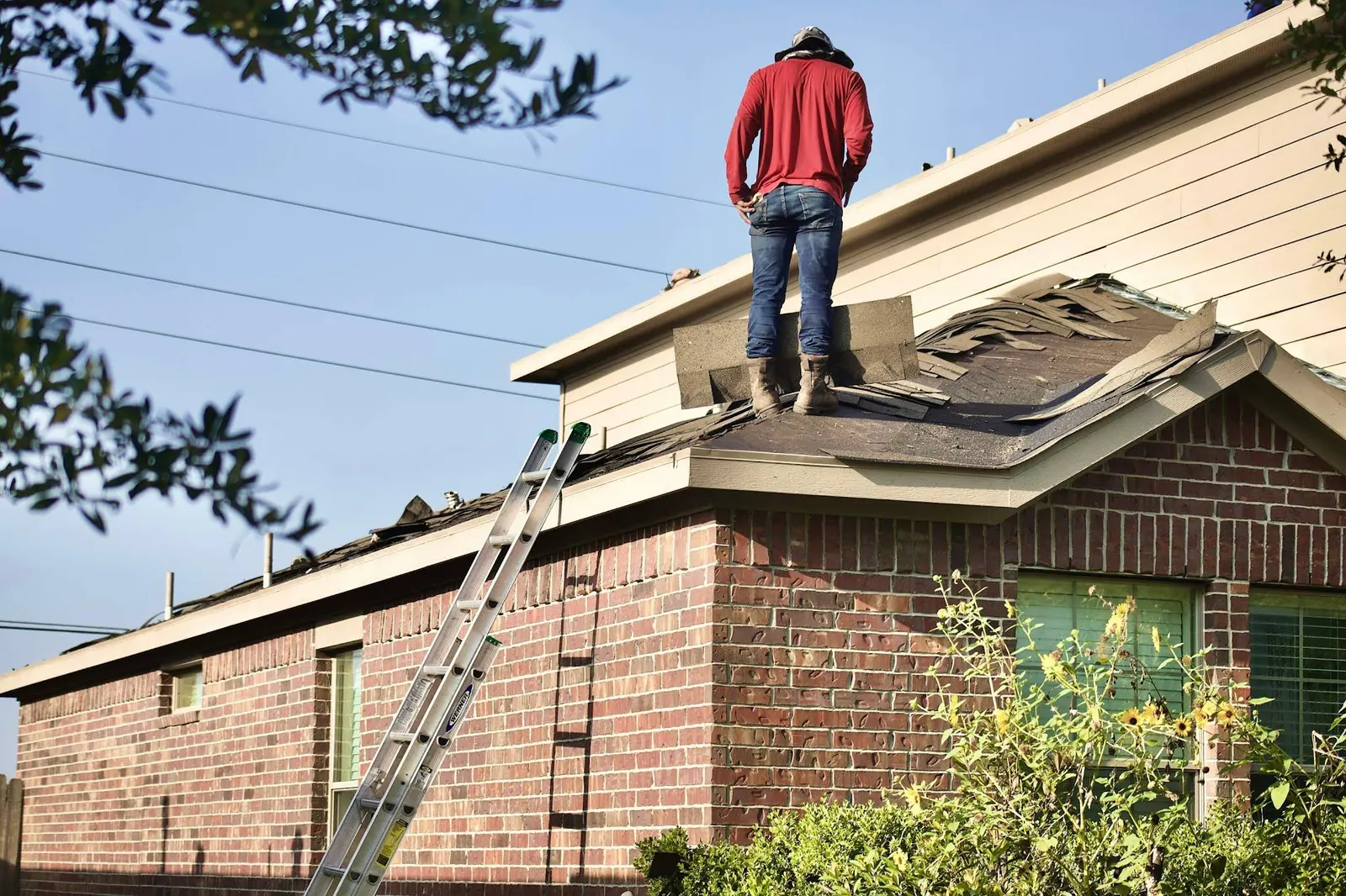 Roof work on a brick home